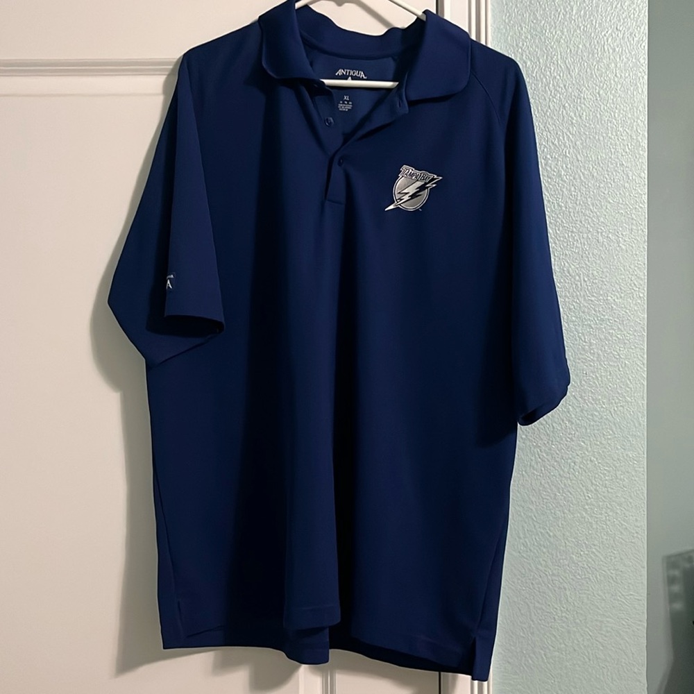 Size XL Antigua Lightning golf polo.